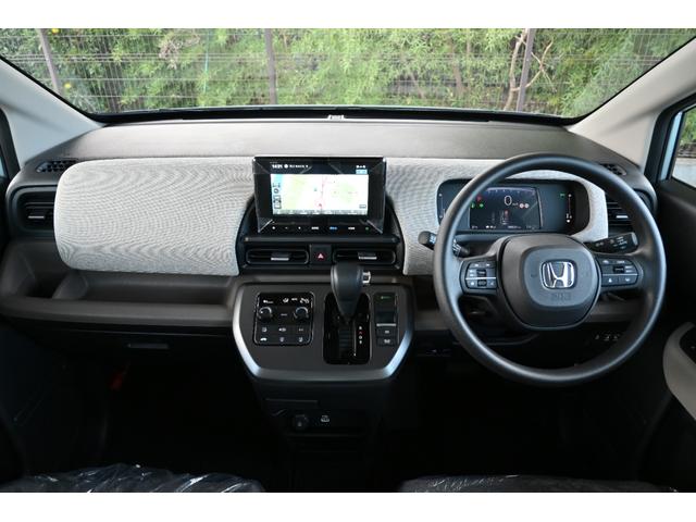 フリード エアー 登録済未使用車 ホンダセンシング 純正8INナビ Rカメラ ETC Fドラレコ 障害物センサー LEDライト 両側Pスライドドア クルコン 横滑り防止機能 サイドカーテンエアバック USB 3列シート(11枚目)