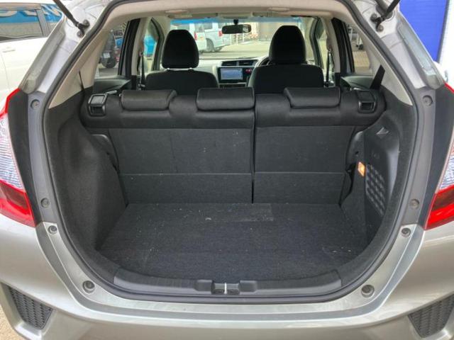 フィットハイブリッド ハイブリッド・Fパッケージ 新品タイヤ/保証書/社外 SDナビ/ヘッドランプ LED/Bluetooth接続/ETC/EBD付ABS/横滑り防止装置/アイドリングストップ/バックモニター/ワンセグTV/DVD/禁煙車 DVD再生(7枚目)