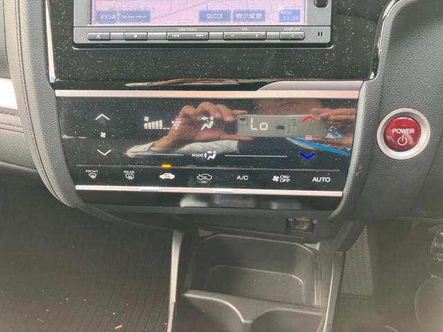 フィットハイブリッド ハイブリッド・Fパッケージ 新品タイヤ/保証書/社外 SDナビ/ヘッドランプ LED/Bluetooth接続/ETC/EBD付ABS/横滑り防止装置/アイドリングストップ/バックモニター/ワンセグTV/DVD/禁煙車 DVD再生(12枚目)