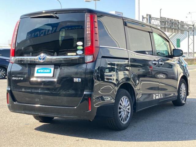 エスクァイア ハイブリッドGiブラックテーラード 新品タイヤ/純正 10インチ SDナビ/フリップダウンモニター/衝突安全装置/両側電動スライドドア/シートヒーター/車線逸脱防止支援システム/シート 合皮/パーキングアシスト バックガイド 禁煙車(3枚目)