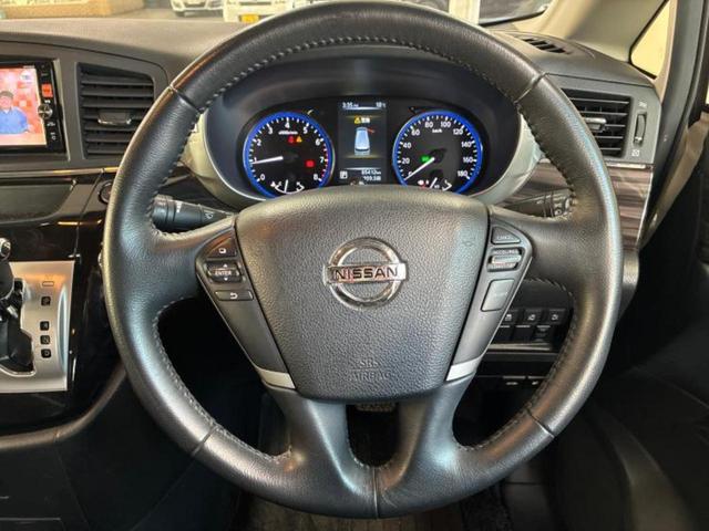 エルグランド ハイウェイスターS 新品タイヤ/保証書/純正 SDナビ/フリップダウンモニター/両側電動スライドドア/シート ハーフレザー/ヘッドランプ LED/Bluetooth接続/ETC/EBD付ABS/横滑り防止装置 DVD再生(13枚目)