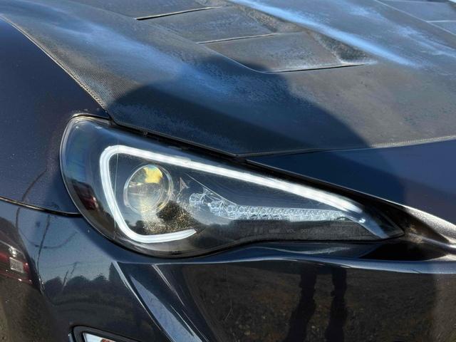 ８６ ＧＴリミテッド　ＥＴＣ　ＭＴ　オートライト　ＨＩＤ　スマートキー　電動格納ミラー　シートヒーター　アルミホイール　盗難防止システム　衝突安全ボディ　ＡＢＳ　ＥＳＣ　エアコン　パワーステアリング　パワーウィンドウ（25枚目）