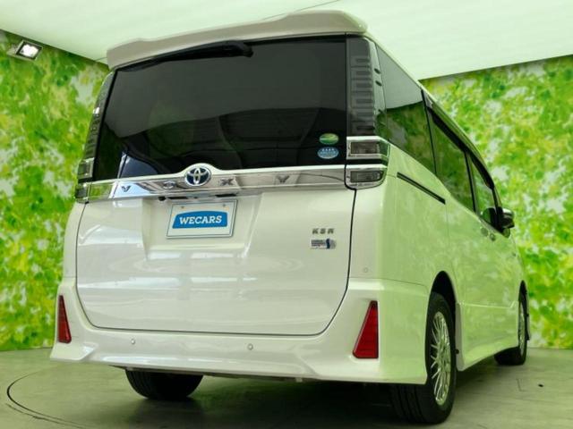 ヴォクシー ハイブリッドZSキラメキ2 新品タイヤ/保証書/社外 11インチ SDナビ/フリップダウンモニター 社外 12.8インチ/トヨタセーフティセンス/両側電動スライドドア/シートヒーター 前席/車線逸脱防止支援システム バックカメラ(3枚目)