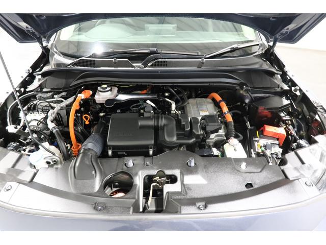 ヴェゼル ｅ：ＨＥＶＺ　認定中古車　２年保証付　ワンオーナー　禁煙車　純正ナビ　バックカメラ　ＥＴＣ　運転支援　盗難防止装置　フルセグテレビ　スマ－トキ－　アクティブクルーズ　パーキングセンサー　ワイヤレス充電　横滑り防止（10枚目）