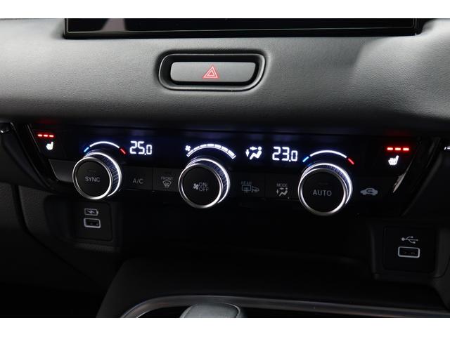 ヴェゼル ｅ：ＨＥＶＺ　認定中古車　２年保証付　ワンオーナー　禁煙車　純正ナビ　バックカメラ　ＥＴＣ　運転支援　盗難防止装置　フルセグテレビ　スマ－トキ－　アクティブクルーズ　パーキングセンサー　ワイヤレス充電　横滑り防止（16枚目）