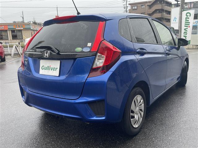 フィット 13G・Fパッケージ ワンオーナー車 スマ-トキ- VSA ETC付き 地デジTV 助手席エアバッグ Rカメラ オートエアコン エアバック PS キ-フリ- PW ABS TVナビ SD アイドリングSTOP(5枚目)