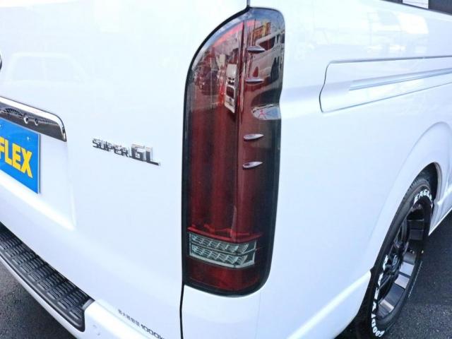 スーパーGL ダークプライムII 未登録新車6型カスタム FLEXシートアレンジVer4 二の字型ベッド車中泊キャンプレジャー仕事対応モデル 対面型ベンチシート エアロフロントリップ 4ナンバー6速ガソリン アルミ SDフルセグナビ(8枚目)