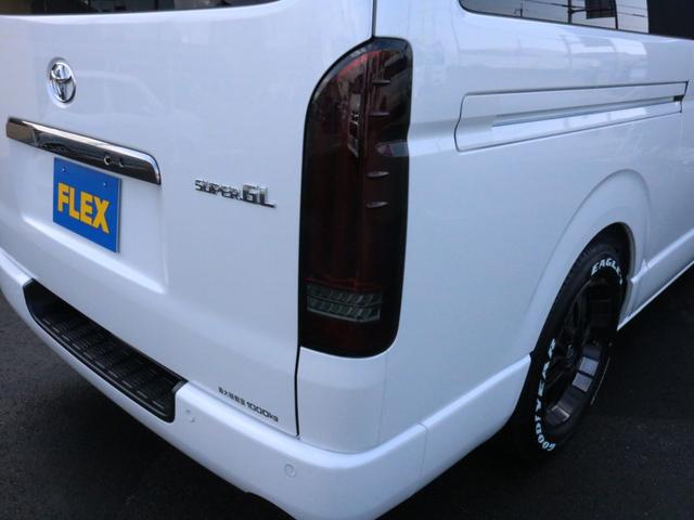 スーパーGL ダークプライムII 未登録新車6型カスタム FLEXシートアレンジVer4 二の字型ベッド車中泊キャンプレジャー仕事対応モデル 対面型ベンチシート エアロフロントリップ 4ナンバー6速ガソリン アルミ SDフルセグナビ(62枚目)