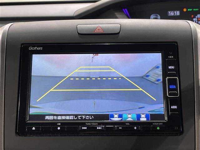 フリードハイブリッド ハイブリッド・クロスターホンダセンシング　純正ナビ　両側パワースライドドア　レーダークルーズコントロール　衝突軽減ブレーキ　シートヒーター　ビルトインＥＴＣ　ＬＥＤヘッドライト　バックカメラ　ドライブレコーダー　純正フロアマット　ＬＥＤフォグ（3枚目）