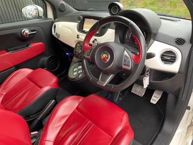 アバルト595 ツーリズモ ナビ 地デジ Bカメラ 社外テール(純正有)カーボンインテリア リアソナー ETC 赤革シート HIDヘッドライト キーレス(10枚目)