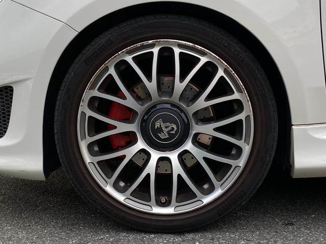 アバルト595 ツーリズモ ナビ 地デジ Bカメラ 社外テール(純正有)カーボンインテリア リアソナー ETC 赤革シート HIDヘッドライト キーレス(23枚目)