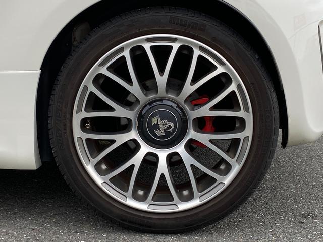 アバルト595 ツーリズモ ナビ 地デジ Bカメラ 社外テール(純正有)カーボンインテリア リアソナー ETC 赤革シート HIDヘッドライト キーレス(24枚目)