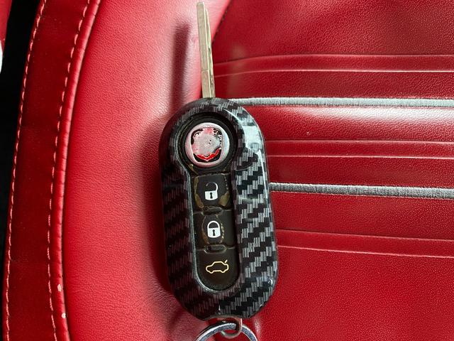 アバルト595 ツーリズモ ナビ 地デジ Bカメラ 社外テール(純正有)カーボンインテリア リアソナー ETC 赤革シート HIDヘッドライト キーレス(54枚目)