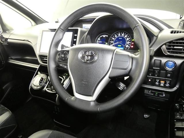 ヴォクシー ハイブリッドZS 煌III フルセグ メモリーナビ 後席モニター バックカメラ 衝突被害軽減システム ETC 両側電動スライド LEDヘッドランプ 3列シート DVD再生 乗車定員7人 オートクルーズコントロール ナビ&TV(2枚目)