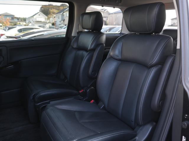 エルグランド 250ハイウェイスターブラックレザー 電動黒本革シート・両側電動スライドドア・バックカメラ・フリップダウンモニター・シートヒーター・LEONLS19インチアルミ・インテリキー・オートA/C・ETC・HIDヘッドライト・プッシュスタート(12枚目)