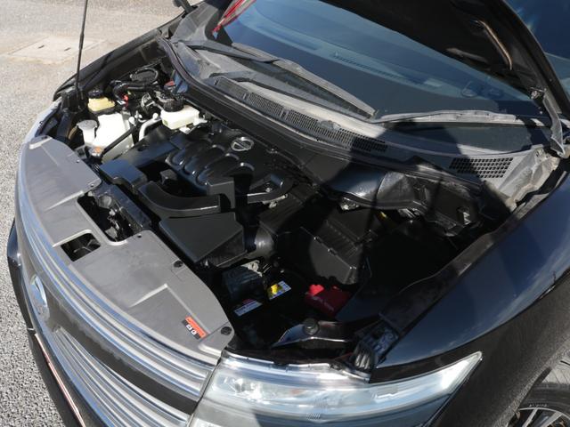 エルグランド 250ハイウェイスターブラックレザー 電動黒本革シート・両側電動スライドドア・バックカメラ・フリップダウンモニター・シートヒーター・LEONLS19インチアルミ・インテリキー・オートA/C・ETC・HIDヘッドライト・プッシュスタート(35枚目)