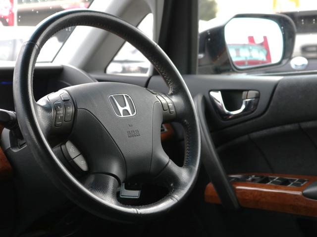 エリシオンプレステージ SG 両側電動スライドドア・ハーフレザーシート・バックカメラ・クルーズコントロール・キーレス・オートA/C・ETC・木目調パネル・HIDヘッドライト・ドアバイザー・純正17インチアルミ・ウィンカーミラー(12枚目)