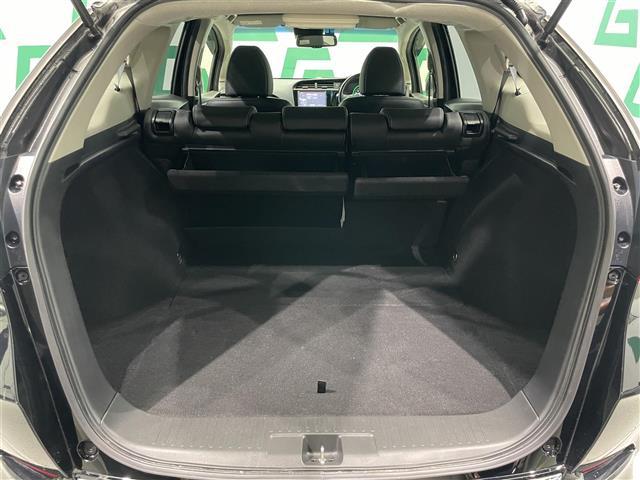 シャトル ハイブリッドZ ホンダセンシング 禁煙車 ホンダセンシング 純正8インチナビ バックカメラ クルーズコントロール 純正フロアマット 前席シートヒーター LEDヘッドライト オートライト 革巻きステアリング ETC 純正アルミホイール(26枚目)