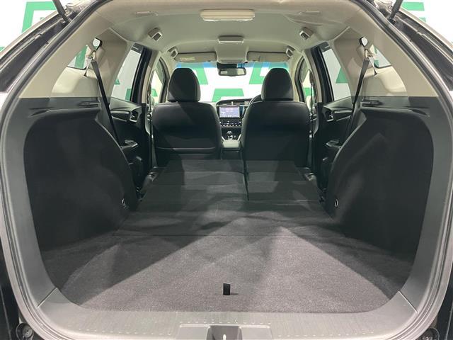 シャトル ハイブリッドZ ホンダセンシング 禁煙車 ホンダセンシング 純正8インチナビ バックカメラ クルーズコントロール 純正フロアマット 前席シートヒーター LEDヘッドライト オートライト 革巻きステアリング ETC 純正アルミホイール(27枚目)