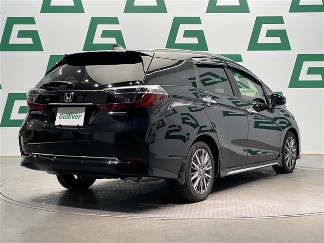 シャトル ハイブリッドZ ホンダセンシング 禁煙車 ホンダセンシング 純正8インチナビ バックカメラ クルーズコントロール 純正フロアマット 前席シートヒーター LEDヘッドライト オートライト 革巻きステアリング ETC 純正アルミホイール(30枚目)