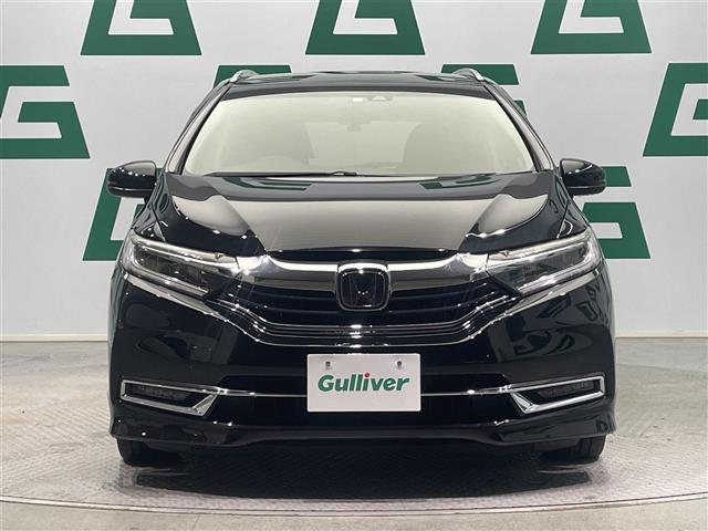 シャトル ハイブリッドZ ホンダセンシング 禁煙車 ホンダセンシング 純正8インチナビ バックカメラ クルーズコントロール 純正フロアマット 前席シートヒーター LEDヘッドライト オートライト 革巻きステアリング ETC 純正アルミホイール(31枚目)