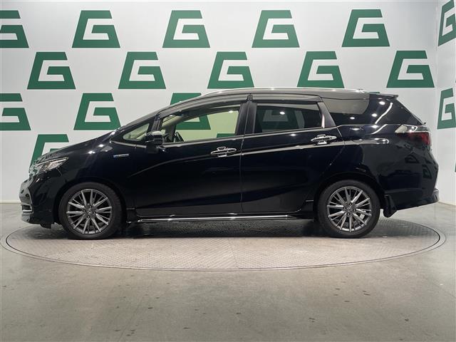 シャトル ハイブリッドZ ホンダセンシング 禁煙車 ホンダセンシング 純正8インチナビ バックカメラ クルーズコントロール 純正フロアマット 前席シートヒーター LEDヘッドライト オートライト 革巻きステアリング ETC 純正アルミホイール(33枚目)