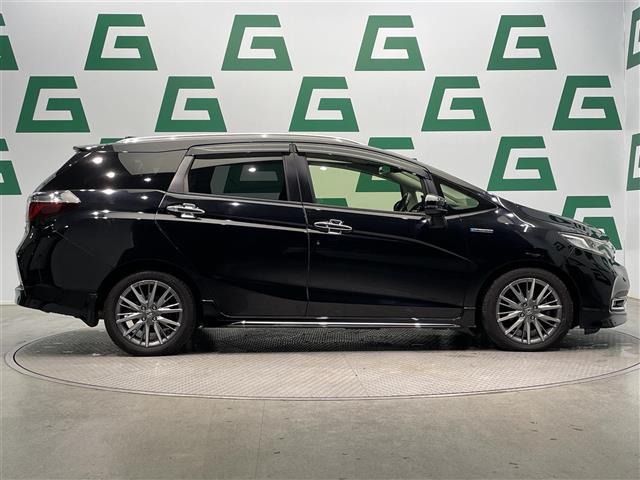 シャトル ハイブリッドZ ホンダセンシング 禁煙車 ホンダセンシング 純正8インチナビ バックカメラ クルーズコントロール 純正フロアマット 前席シートヒーター LEDヘッドライト オートライト 革巻きステアリング ETC 純正アルミホイール(34枚目)