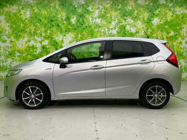 フィットハイブリッド ハイブリッド・Ｌパッケージ　新品タイヤ／保証書／純正　ＳＤナビ／シート　ハーフレザー／ヘッドランプ　ＬＥＤ／Ｂｌｕｅｔｏｏｔｈ接続／ＥＴＣ／ＥＢＤ付ＡＢＳ／横滑り防止装置／アイドリングストップ／バックモニター／ワンセグＴＶ（2枚目）