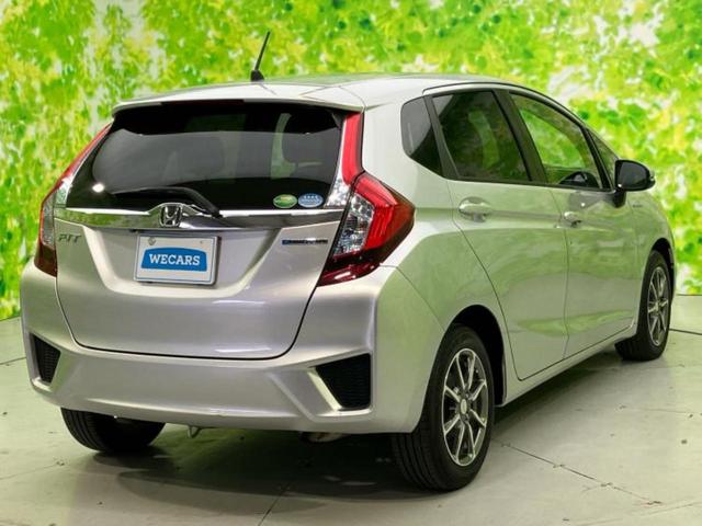 フィットハイブリッド ハイブリッド・Ｌパッケージ　新品タイヤ／保証書／純正　ＳＤナビ／シート　ハーフレザー／ヘッドランプ　ＬＥＤ／Ｂｌｕｅｔｏｏｔｈ接続／ＥＴＣ／ＥＢＤ付ＡＢＳ／横滑り防止装置／アイドリングストップ／バックモニター／ワンセグＴＶ（3枚目）