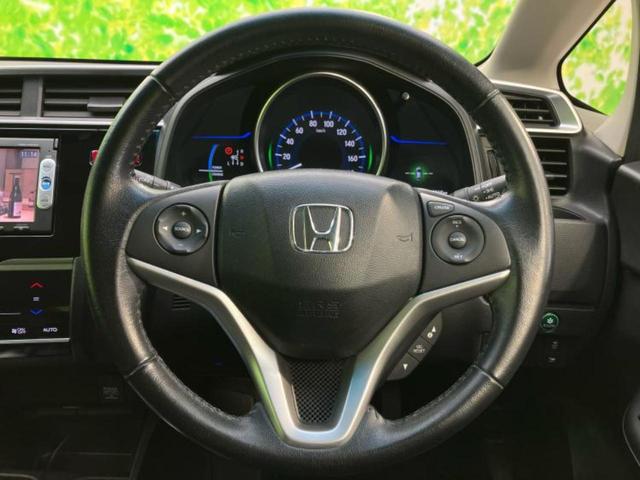 フィットハイブリッド ハイブリッド・Ｌパッケージ　新品タイヤ／保証書／純正　ＳＤナビ／シート　ハーフレザー／ヘッドランプ　ＬＥＤ／Ｂｌｕｅｔｏｏｔｈ接続／ＥＴＣ／ＥＢＤ付ＡＢＳ／横滑り防止装置／アイドリングストップ／バックモニター／ワンセグＴＶ（14枚目）