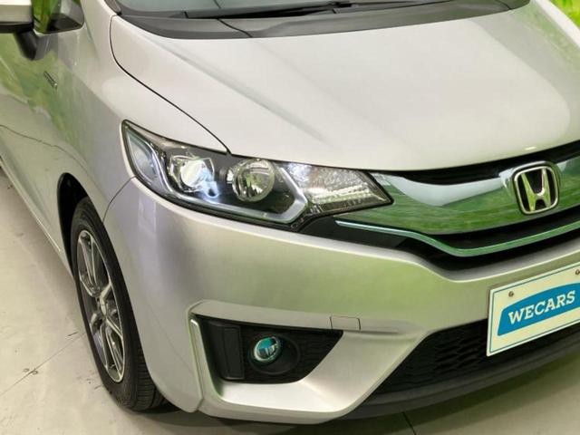 フィットハイブリッド ハイブリッド・Ｌパッケージ　新品タイヤ／保証書／純正　ＳＤナビ／シート　ハーフレザー／ヘッドランプ　ＬＥＤ／Ｂｌｕｅｔｏｏｔｈ接続／ＥＴＣ／ＥＢＤ付ＡＢＳ／横滑り防止装置／アイドリングストップ／バックモニター／ワンセグＴＶ（34枚目）