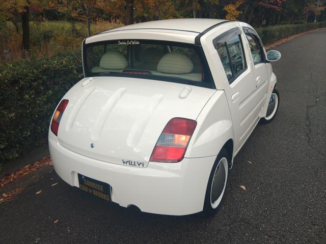 WiLL Vi ベースグレード カボチャ馬車 クリフカットシルエット 共同プロジェクト開発車 グッドデザイン賞受賞車 フランスパン内装 ナビ フロントパワーウィンドゥ パワーステアリング(6枚目)