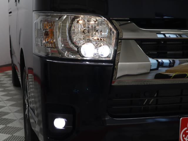 ハイエースバン スーパーＧＬ　ダークプライムＩＩ　純正７インチナビ／パノラミックビューモニター／デジタルインナーミラー／純正ルーフキャリア／純正リアラダー／ベットキット／荷台フローリングカバー／両側電動スライドドア／純正１５インチＡＷ（16枚目）