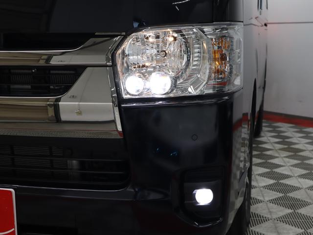 ハイエースバン スーパーＧＬ　ダークプライムＩＩ　純正７インチナビ／パノラミックビューモニター／デジタルインナーミラー／純正ルーフキャリア／純正リアラダー／ベットキット／荷台フローリングカバー／両側電動スライドドア／純正１５インチＡＷ（18枚目）