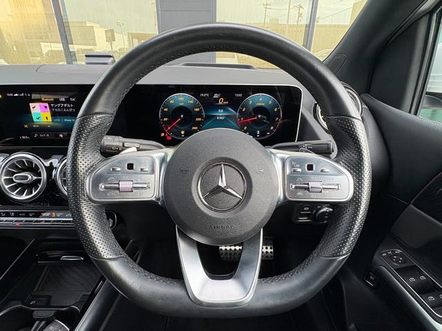 Ｂクラス Ｂ１８０　ＡＭＧレザーエクスクルーシブパッケージ　レザーエクスクルーシブＰ　黒革シート　シートヒーター　サンルーフ　ヘッドアップディスプレイ　アンビエントライト　衝突軽減ブレーキ　アダプティブクルーズコントロール　ブラインドスポットモニター　純正ナビ（10枚目）