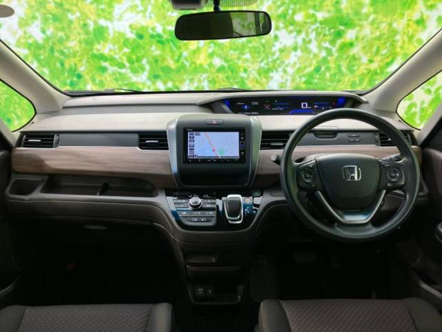 フリード+ハイブリッド ハイブリッドGホンダセンシング 新品タイヤ/保証書/純正 メモリーナビ/ホンダセンシング/両側電動スライドドア/シートヒーター 前席/車線逸脱防止支援システム/ヘッドランプ LED/Bluetooth接続/ETC/EBD付ABS(4枚目)