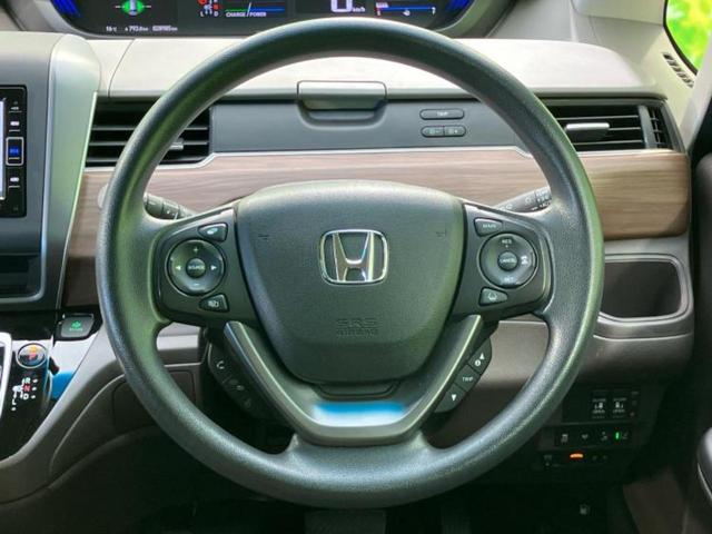 フリード+ハイブリッド ハイブリッドGホンダセンシング 新品タイヤ/保証書/純正 メモリーナビ/ホンダセンシング/両側電動スライドドア/シートヒーター 前席/車線逸脱防止支援システム/ヘッドランプ LED/Bluetooth接続/ETC/EBD付ABS(14枚目)