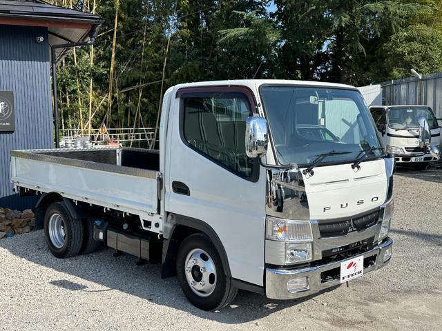 キャンター 全低床 メッキパーツ/カーナビゲーション/バックカメラ/ETC/左側電動格納ミラー/新品 アオリアルミ縞鋼板/新品 荷台鉄板張り/積載量2000Kg/(9枚目)