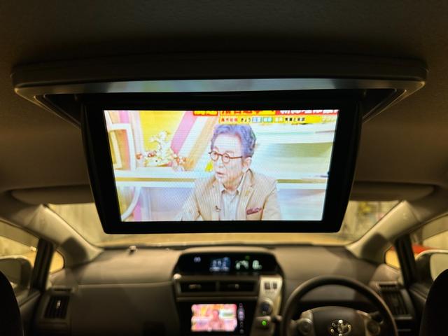 プリウスアルファ Ｓ　ＥＴＣ　バックカメラ　ナビ　ＴＶ　オートライト　後席モニター　スマートキー　電動格納ミラー　３列シート　ＣＶＴ　盗難防止システム　衝突安全ボディ　ＡＢＳ　ＥＳＣ　ＣＤ　ＤＶＤ再生（24枚目）