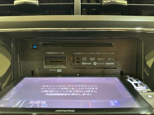 プリウスアルファ Ｓ　ＥＴＣ　バックカメラ　ナビ　ＴＶ　オートライト　後席モニター　スマートキー　電動格納ミラー　３列シート　ＣＶＴ　盗難防止システム　衝突安全ボディ　ＡＢＳ　ＥＳＣ　ＣＤ　ＤＶＤ再生（33枚目）
