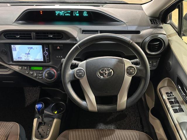 アクア G ETC バックカメラ ナビ TV アルミホイール オートライト ヘッドライトウォッシャー スマートキー 電動格納ミラー 衝突安全ボディ ABS ESC CD DVD再生 ABS リヤスポイラー(7枚目)