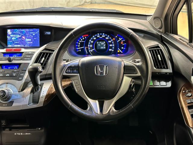 オデッセイ MX・エアロパッケージ ETC バックカメラ ナビ TV HID キーレス 電動格納ミラー 3列シート CVT アルミホイール CD DVD再生 衝突安全ボディ ABS ESC エアコン ABS エアバッグ Wエアコン(7枚目)