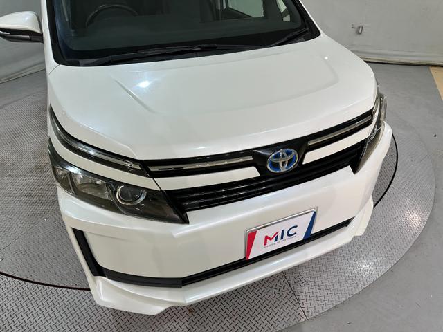 ヴォクシー ハイブリッドＸ　バックカメラ　ナビ　ＴＶ　両側スライド・片側電動　オートライト　ＬＥＤヘッドランプ　スマートキー　電動格納ミラー　３列シート　ＣＶＴ　アルミホイール　ＣＤ　ＤＶＤ再生　Ｂｌｕｅｔｏｏｔｈ（24枚目）