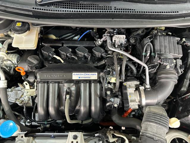フィットハイブリッド Ｌパッケージ　ハイブリッド　ＥＴＣ　バックカメラ　ナビ　オートクルーズコントロール　オートライト　ＬＥＤヘッドランプ　スマートキー　電動格納ミラー　ＡＴ　盗難防止システム　衝突安全ボディ　ＣＤ　ＤＶＤ再生（20枚目）