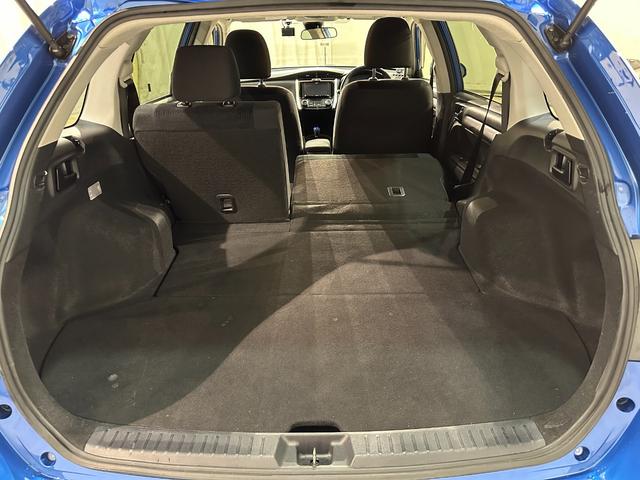 カローラフィールダー ハイブリッドＧ　ドライブレコーダー　ＥＴＣ　バックカメラ　ナビ　衝突被害軽減システム　オートマチックハイビーム　キーレスエントリー　電動格納ミラー　ＣＶＴ　衝突安全ボディ　ＡＢＳ　ＥＳＣ　ＣＤ　パワーウインドウ（21枚目）