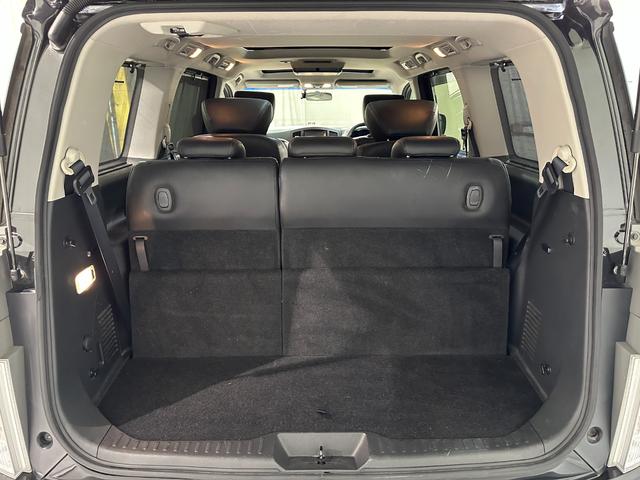 エルグランド ２５０ハイウェイスター　ハーフレザー　バックカメラ　ナビ　ＴＶ　両側電動スライドドア　オートライト　ＨＩＤ　サンルーフ　スマートキー　電動格納ミラー　３列シート　オットマン　Ｗエアコン　アルミホイール　ＣＤ　ＤＶＤ再生（21枚目）