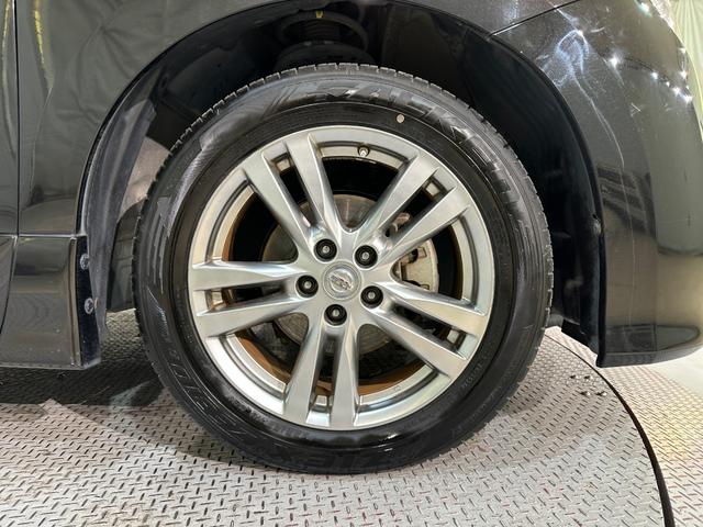 エルグランド ２５０ハイウェイスター　ハーフレザー　バックカメラ　ナビ　ＴＶ　両側電動スライドドア　オートライト　ＨＩＤ　サンルーフ　スマートキー　電動格納ミラー　３列シート　オットマン　Ｗエアコン　アルミホイール　ＣＤ　ＤＶＤ再生（50枚目）