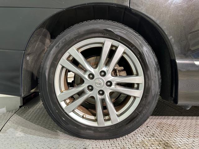 エルグランド ２５０ハイウェイスター　ハーフレザー　バックカメラ　ナビ　ＴＶ　両側電動スライドドア　オートライト　ＨＩＤ　サンルーフ　スマートキー　電動格納ミラー　３列シート　オットマン　Ｗエアコン　アルミホイール　ＣＤ　ＤＶＤ再生（51枚目）