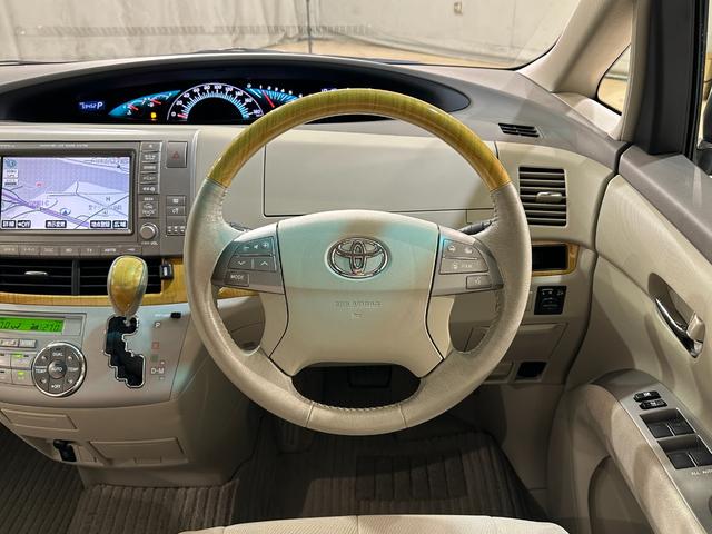 エスティマ アエラス ETC バックカメラ ナビ 両側電動スライドドア オートライト HID スマートキー 電動格納ミラー 3列シート オットマン CVT アルミホイール CD DVD再生 MD パワーウインドウ(3枚目)