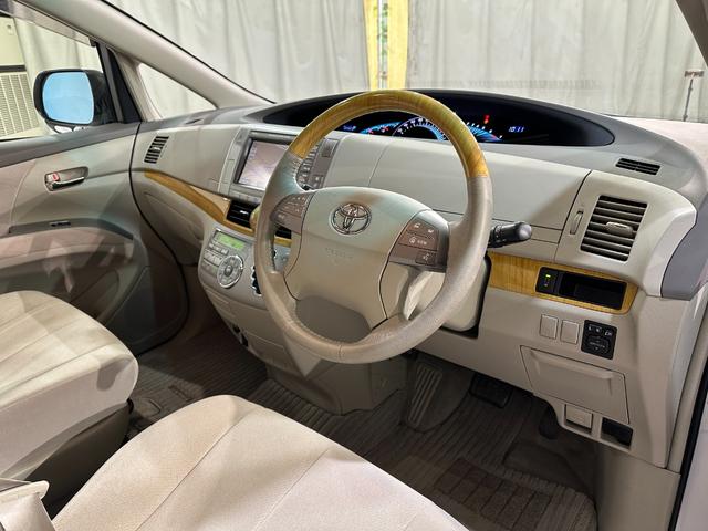 エスティマ アエラス ETC バックカメラ ナビ 両側電動スライドドア オートライト HID スマートキー 電動格納ミラー 3列シート オットマン CVT アルミホイール CD DVD再生 MD パワーウインドウ(27枚目)